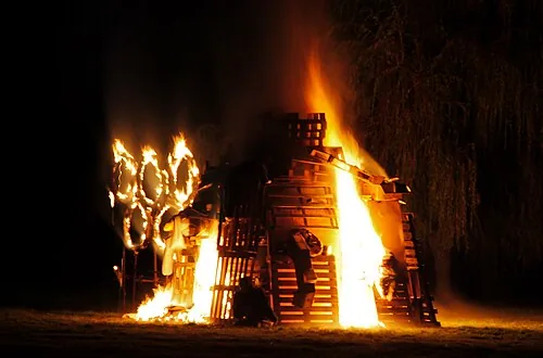 Fireworks over a crowd on bonfire night
